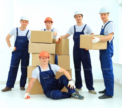 Removal team helping with a home move in Chadwellheath