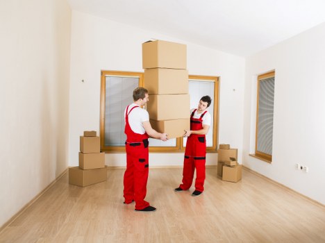 Furniture being carried carefully during a house removal
