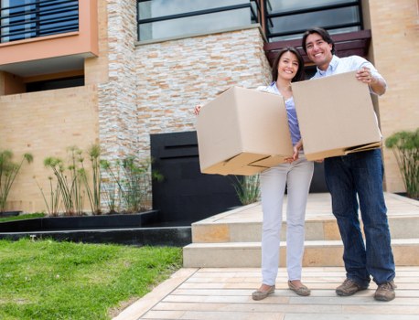 Business relocation checklist and packed equipment for a move