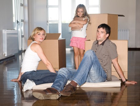 Careful loading of office items for a business move in Chadwellheath